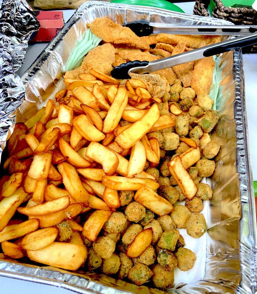 Easy Campfire Dinner Recipes for Families 7 Fried catfish, okra and french fries sitting in a foil container